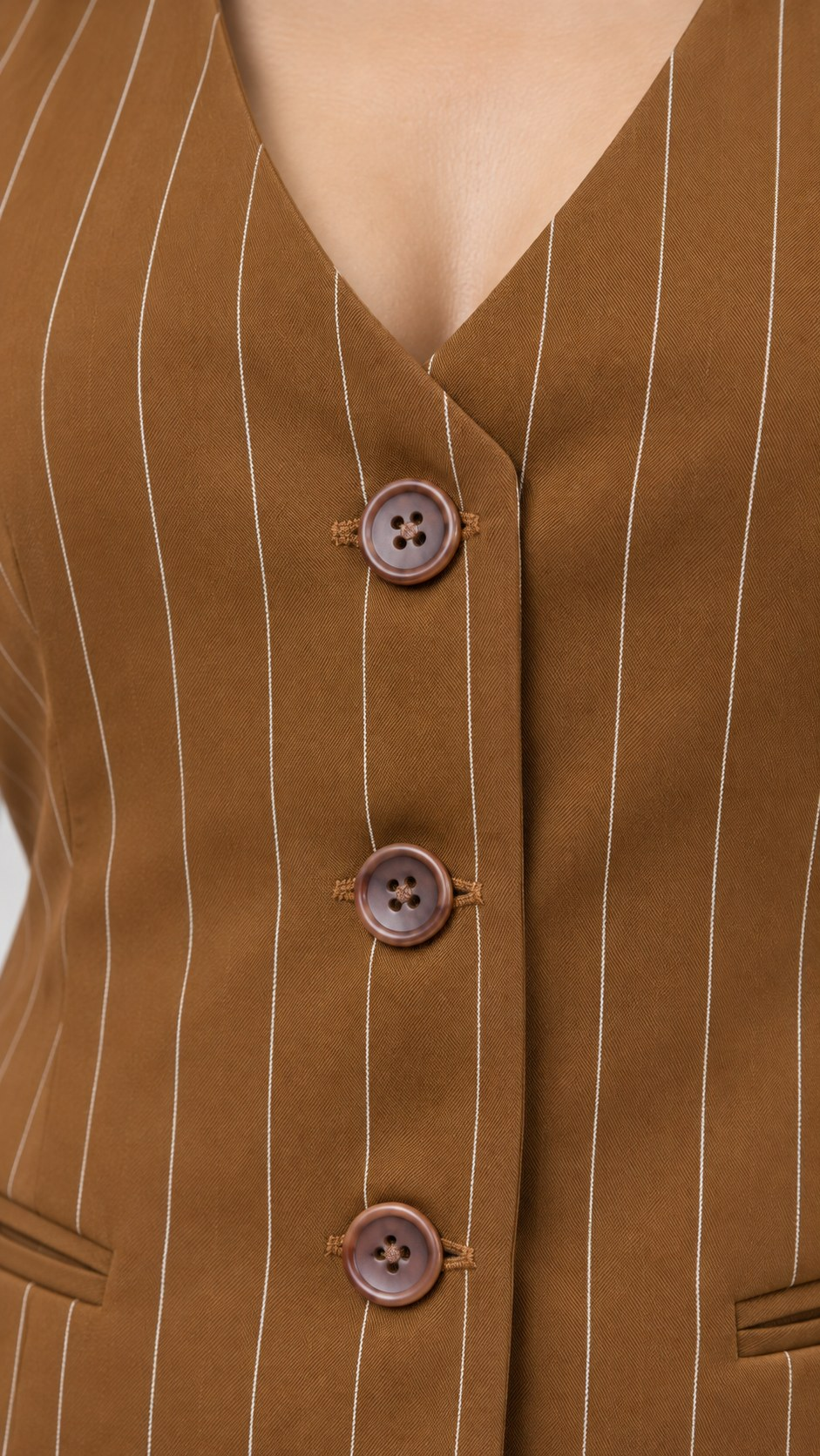 Brown pinstripe waistcoat close-up of buttons and pinstripe fabric detail | Beyond Formals