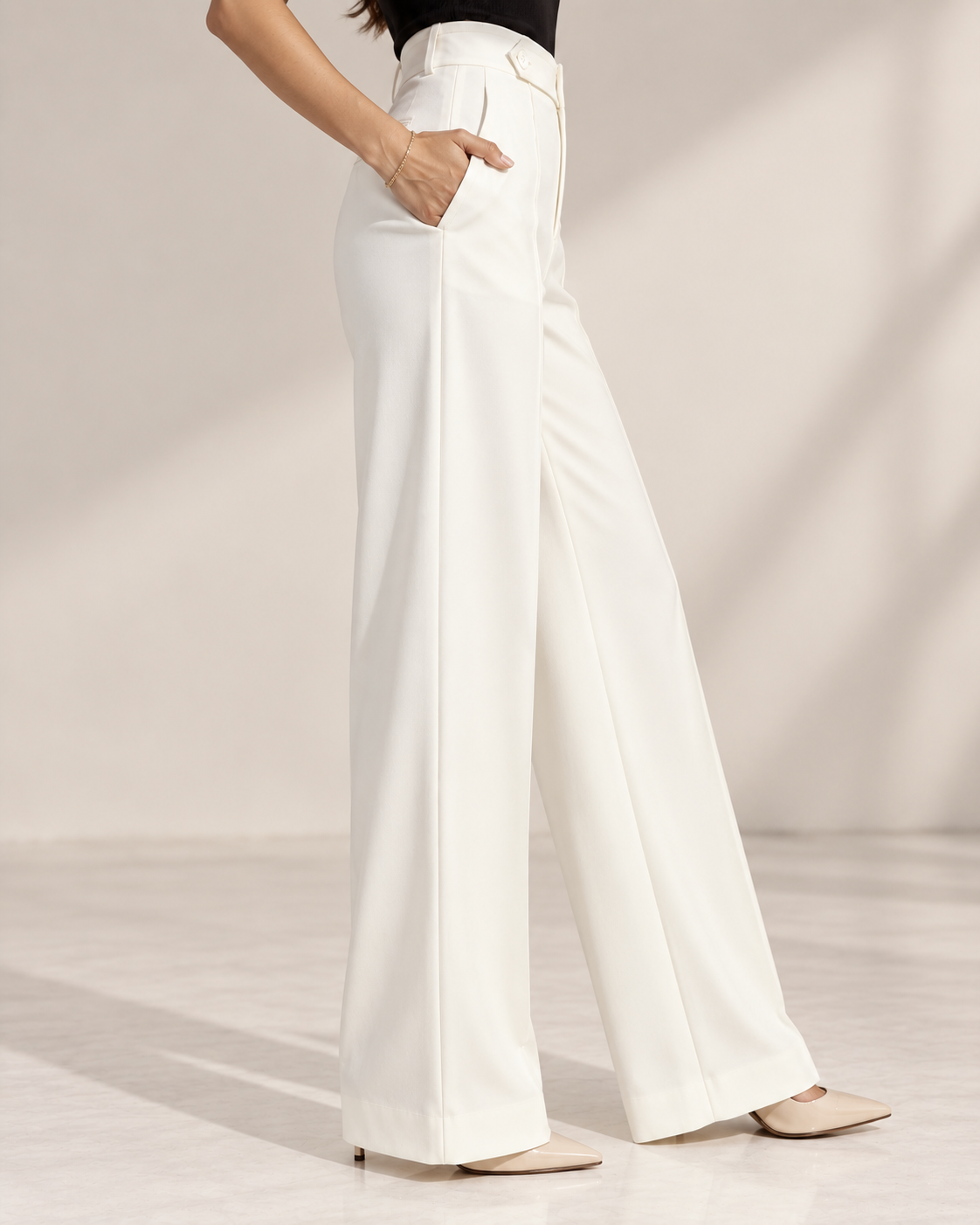 Off-white ultra high-waist wide-leg trousers, side view | Beyond Formals