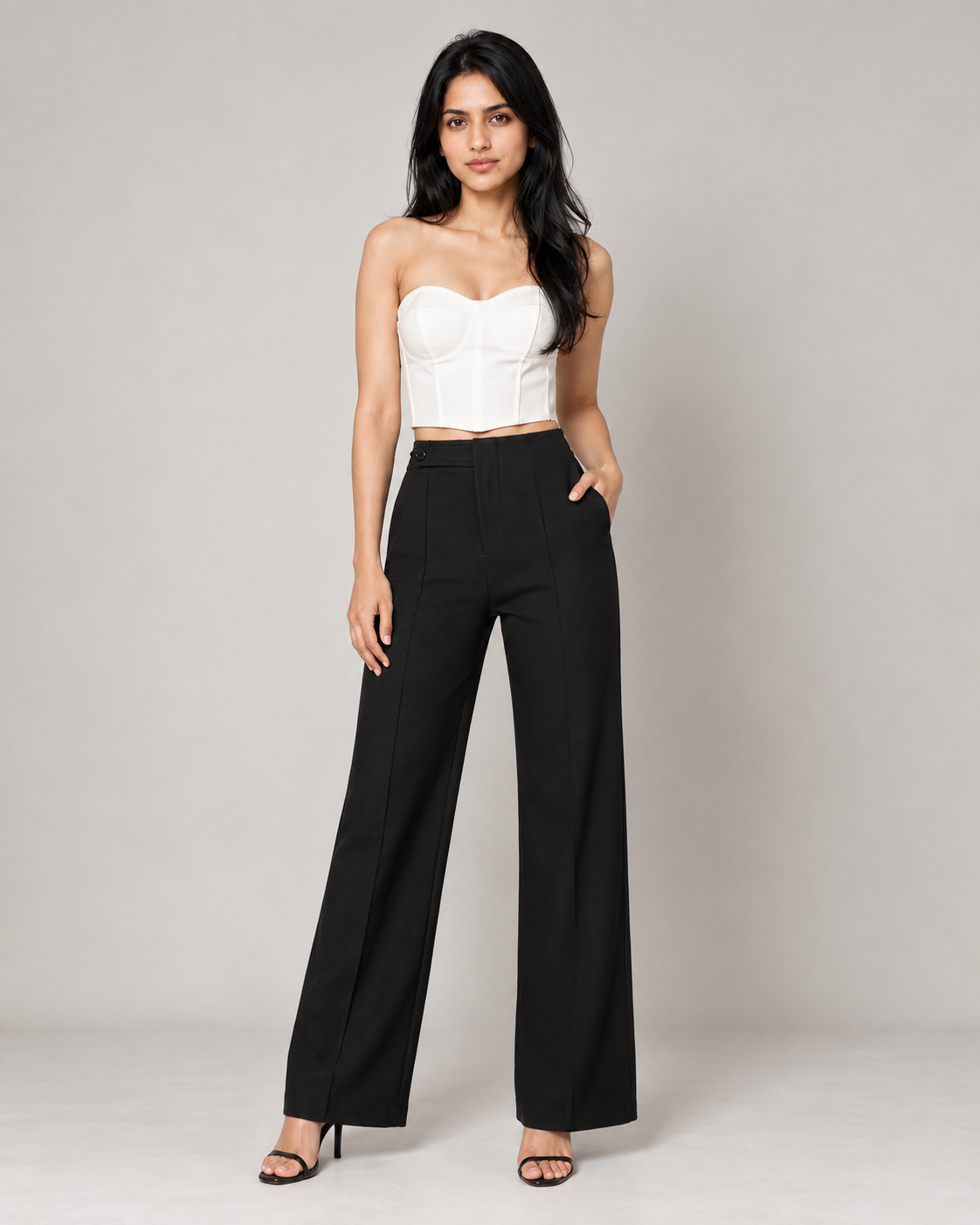 Black ultra high-waist wide-leg trousers with white bustier, full-length front view | Beyond Formals