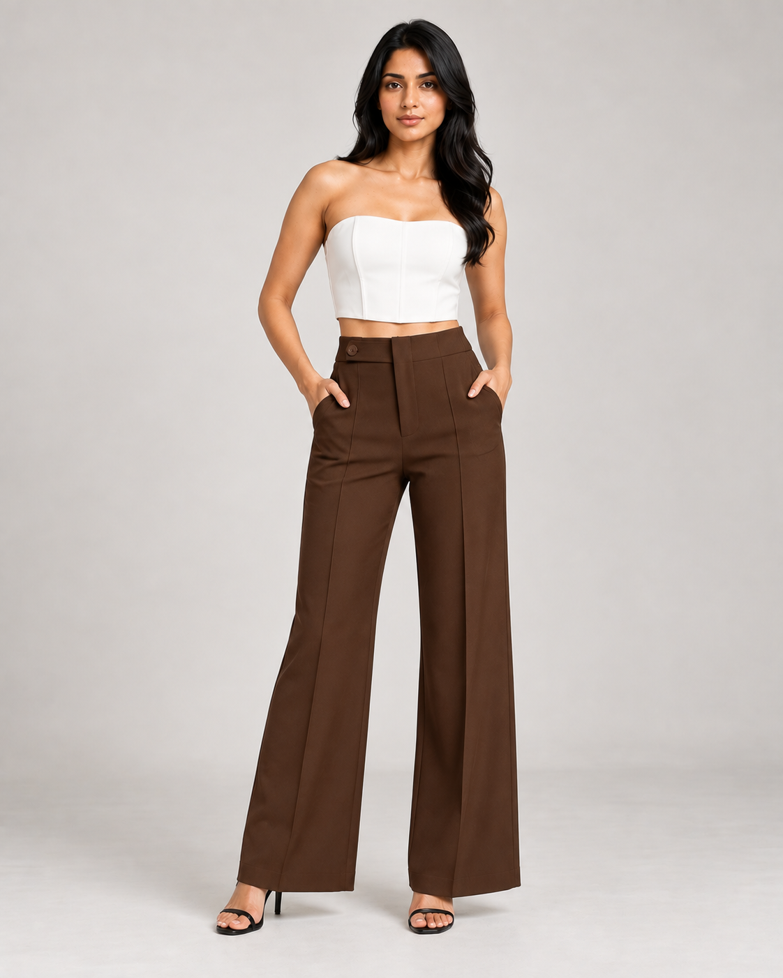 Brown ultra high-waist wide-leg trousers with white bustier, full-length front view | Beyond Formals