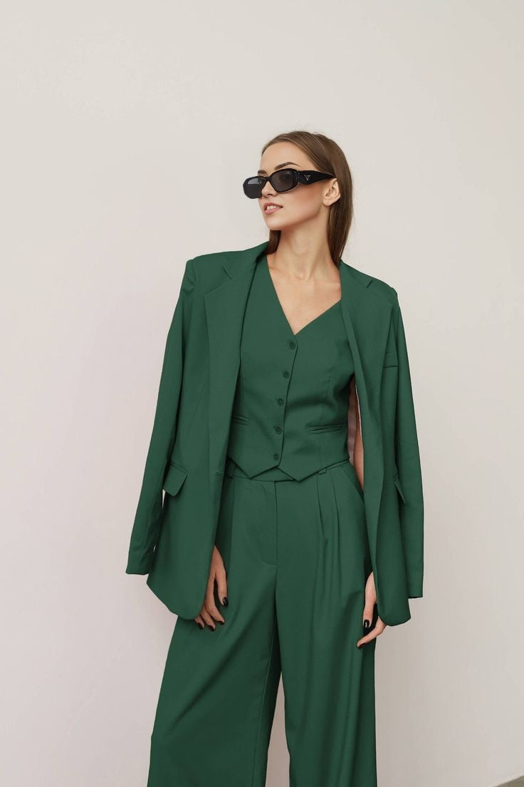 green blazer suit set with high-waisted wide-leg trousers