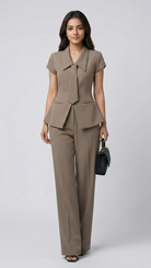 Woman wearing a beige suit on a white background