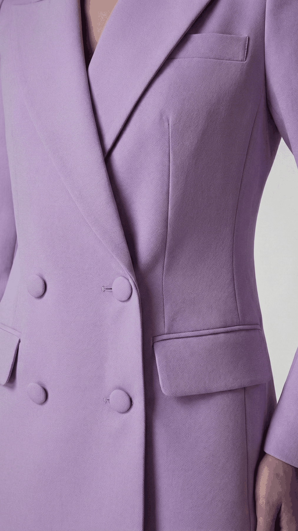 Lavender double-breasted blazer, close-up of self-covered buttons and flap pocket | Beyond Formals