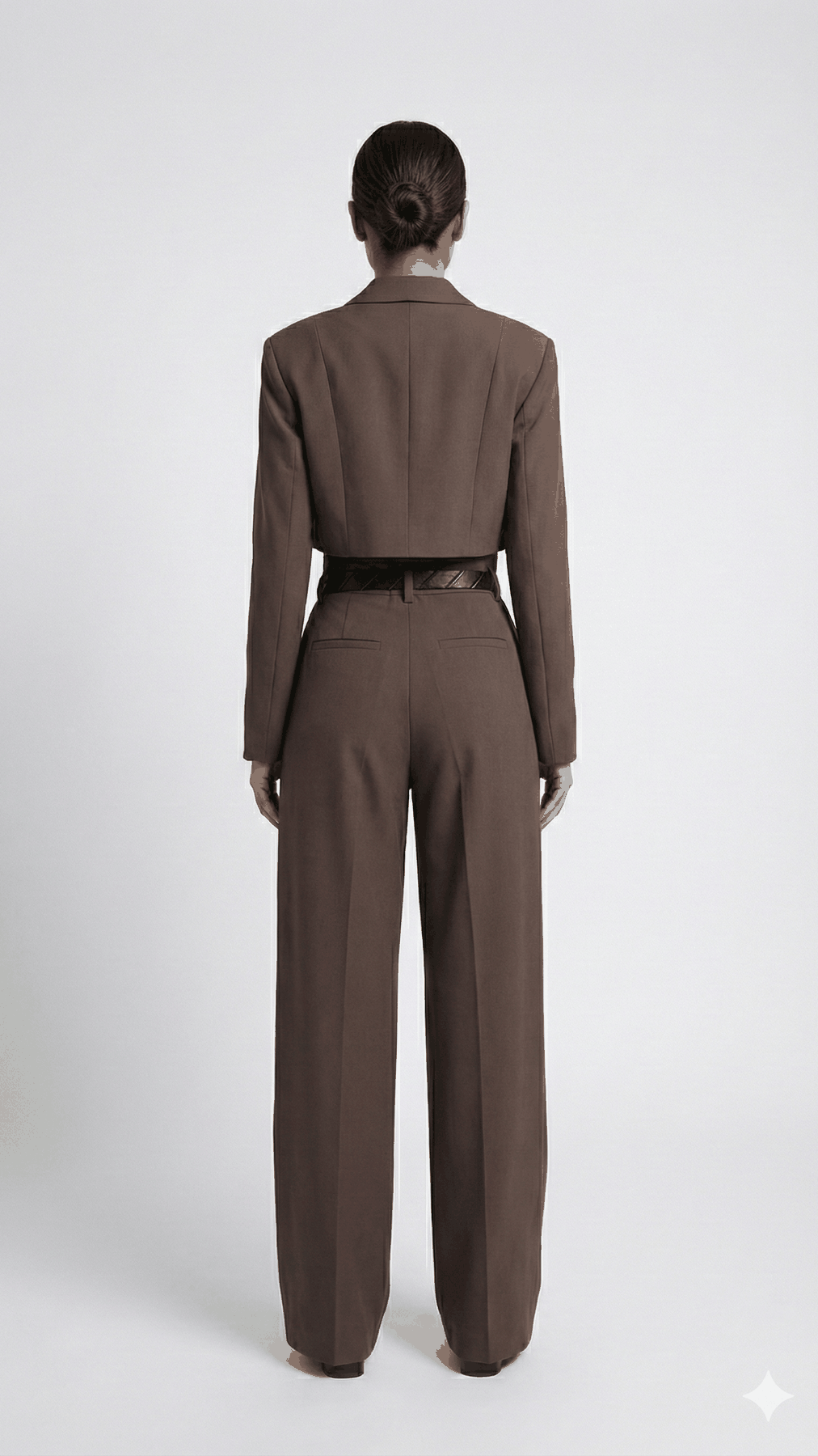 Brown cropped blazer suit set on model, back view showing back welt pockets and wide leg | Beyond Formals