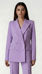 Woman wearing a lavender suit on a white background
