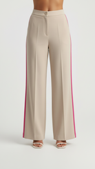 Beige wide-leg pants with a red stripe on a white background