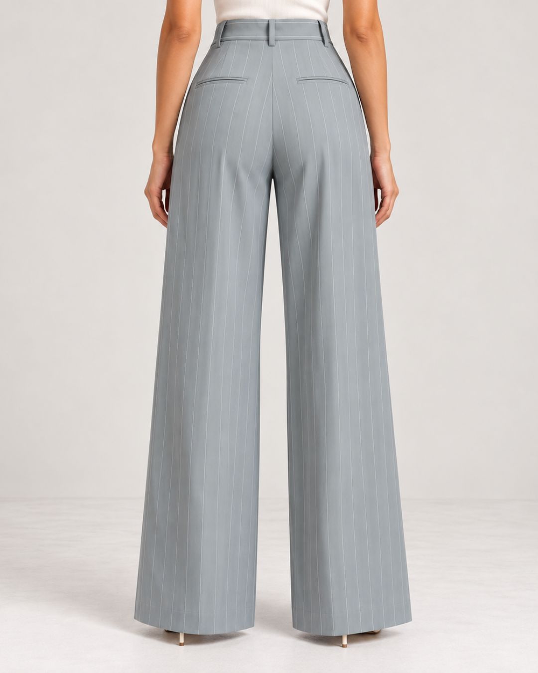Back view of grey pinstripe wide-leg trousers showing waistband and back pockets | Beyond Formals
