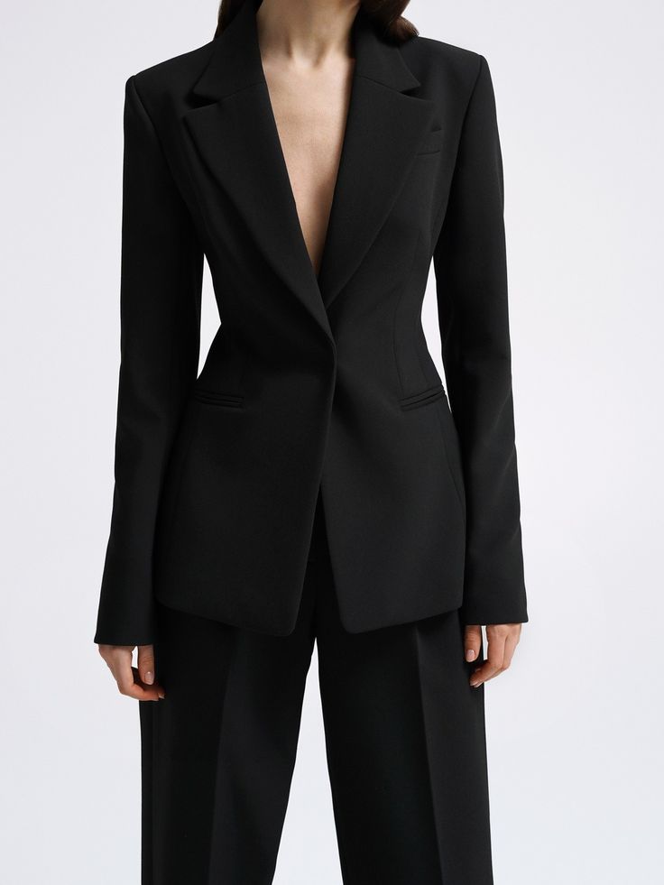 Women's black tailored blazer suit set with straight-fit trousers for office wear.
