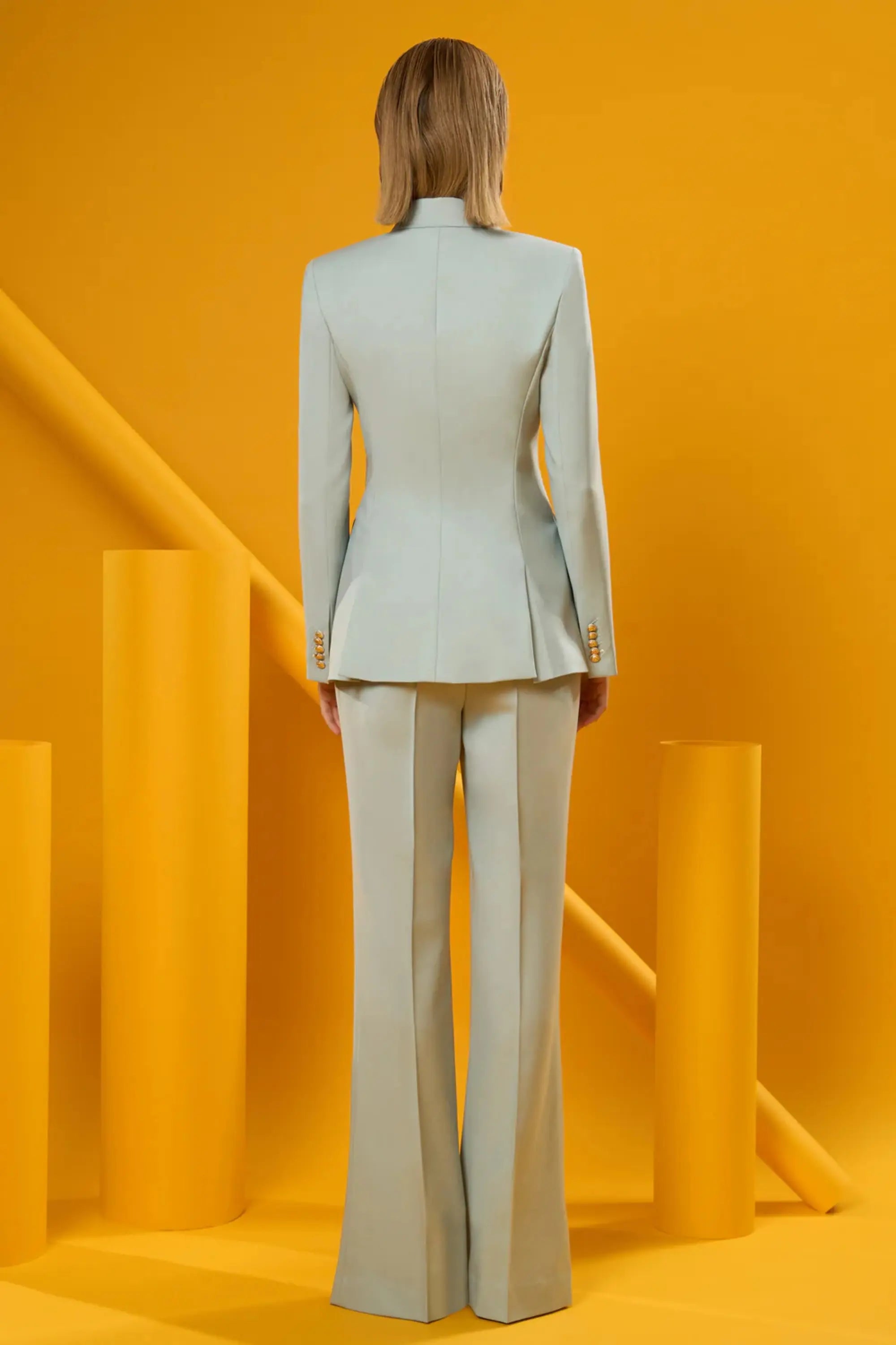 Women's mint blazer suit set with a modern tailored fit.