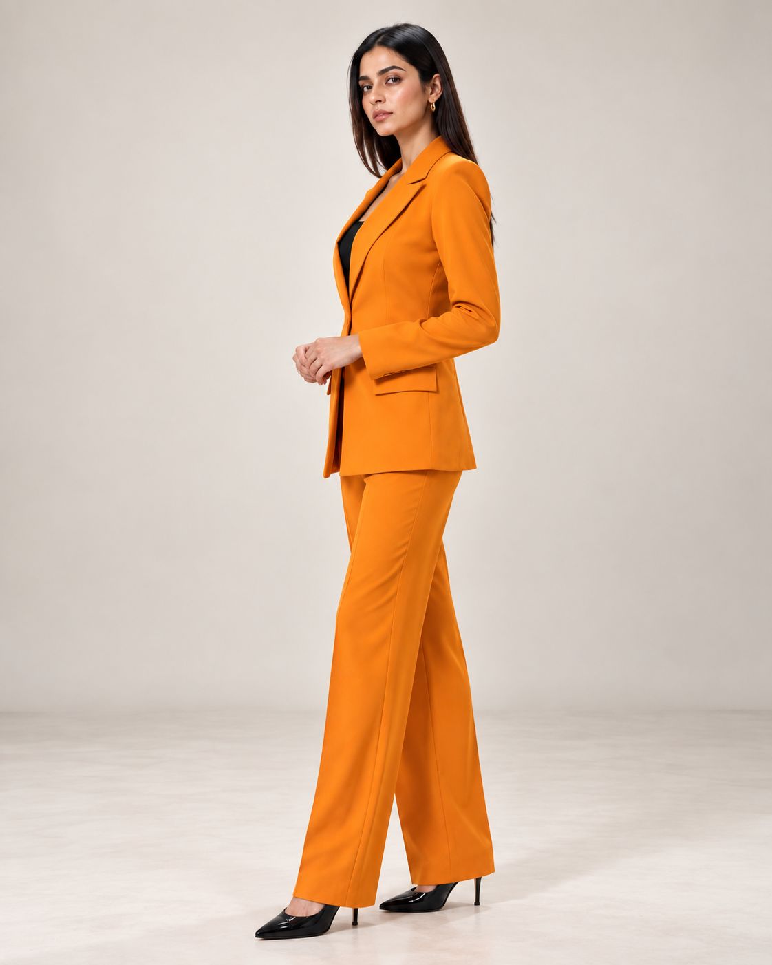 Mustard-orange single-breasted pant suit set – side view | Beyond Formals
