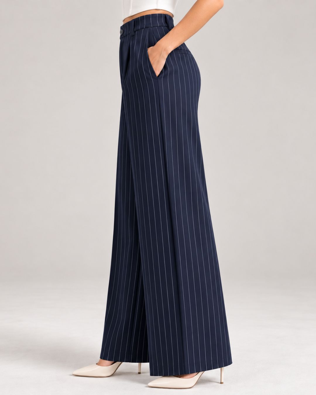 Navy pinstripe wide-leg trousers, side view showing drape and side pocket | Beyond Formals