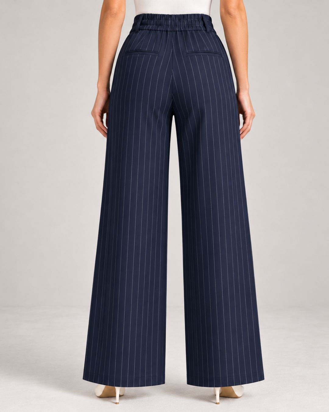 Back view of navy pinstripe wide-leg trousers showing elasticated waistband | Beyond Formals
