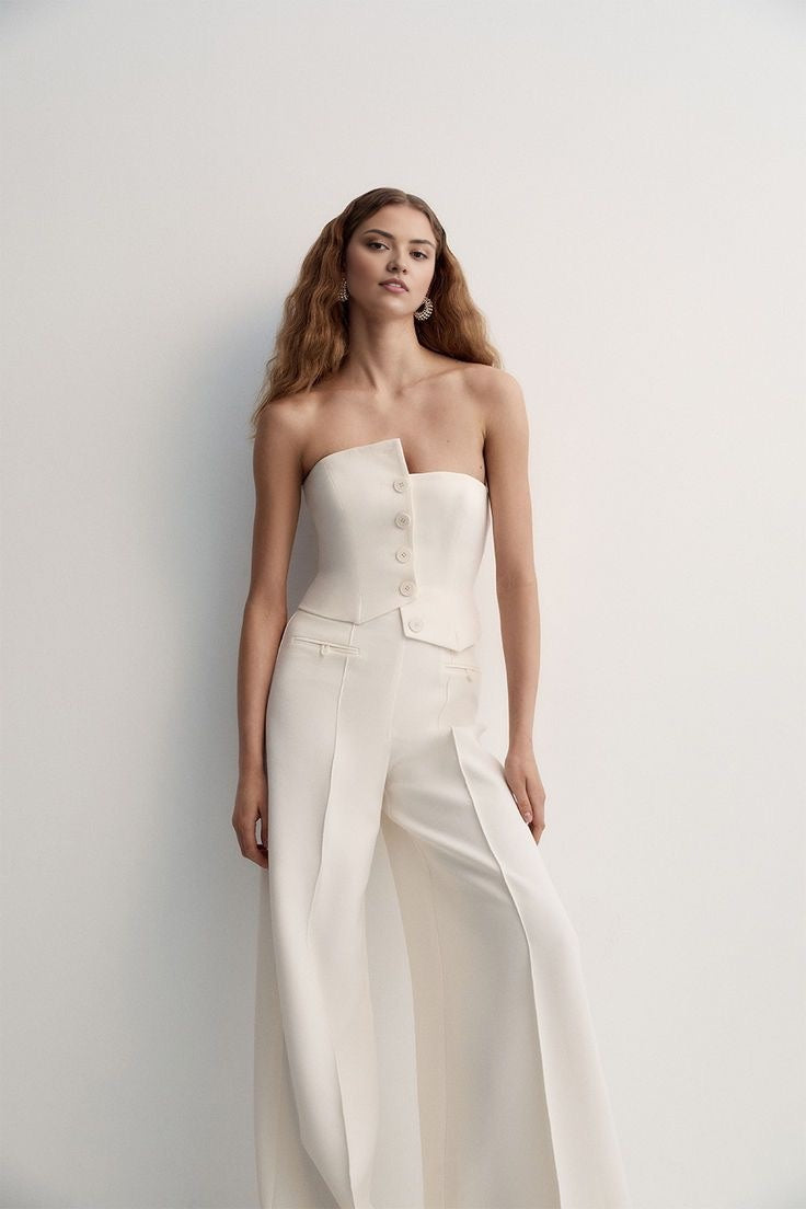 white bustier with panels for a bold formal statement.