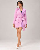 Pink and lavender two-tone double-breasted blazer dress with waist tie – front view on model | Beyond Formals