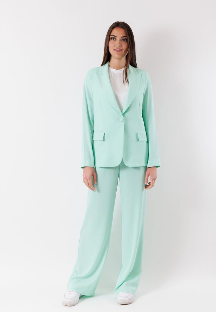 Women's blazer with padded shoulders and a tailored fit.