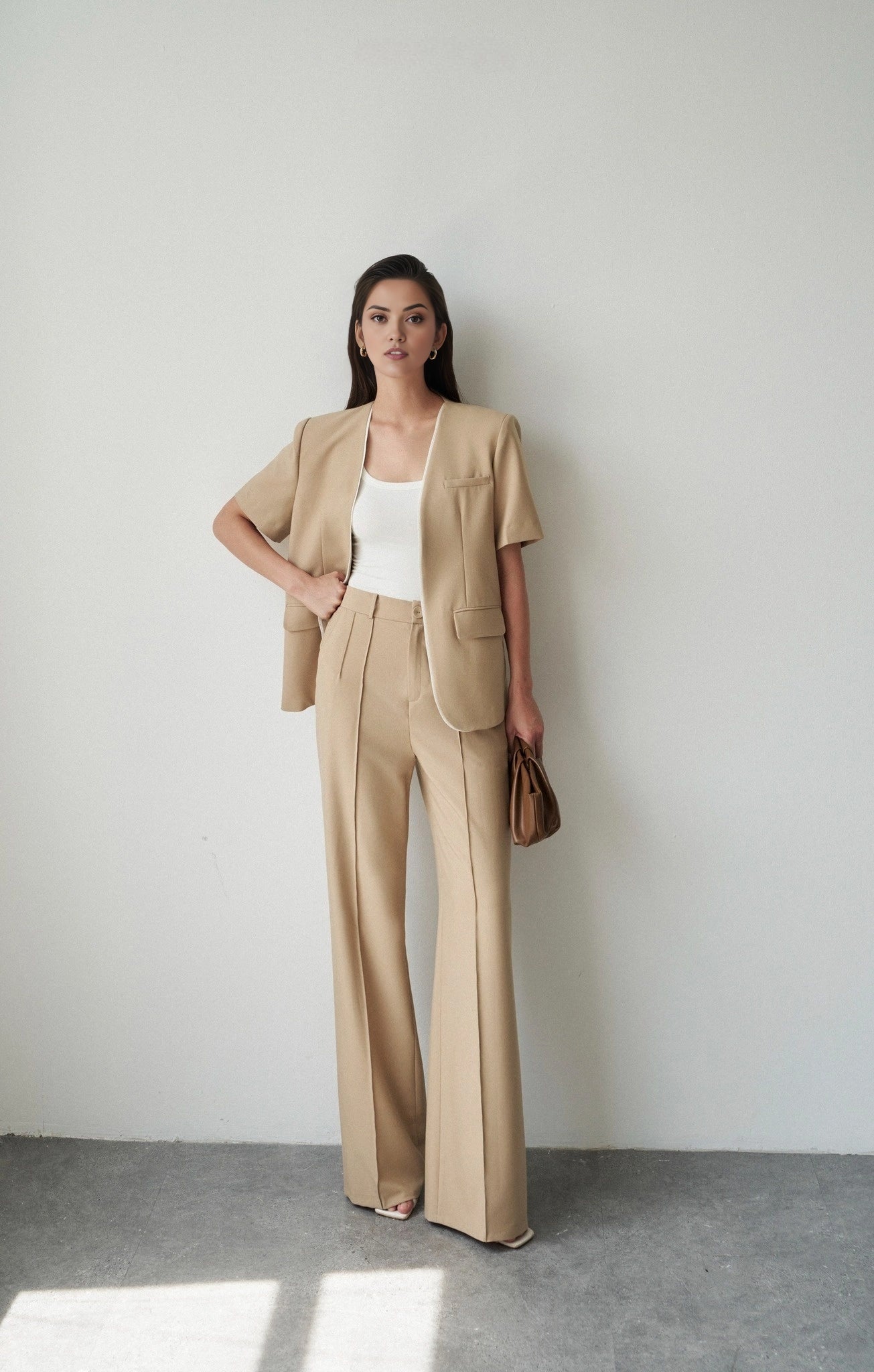 Women's cotton short sleeve co-ord set featuring a longline blazer and tailored pants.