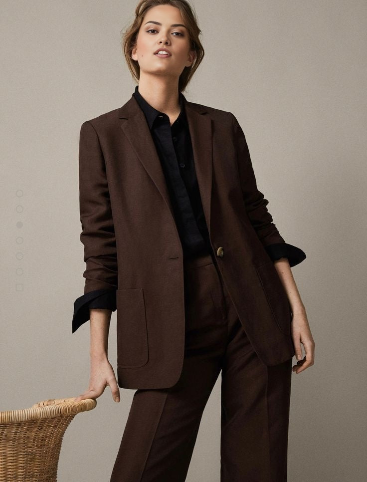 Women's mocha muse fitted blazer with a notched lapel, pocket detailing and single closure.