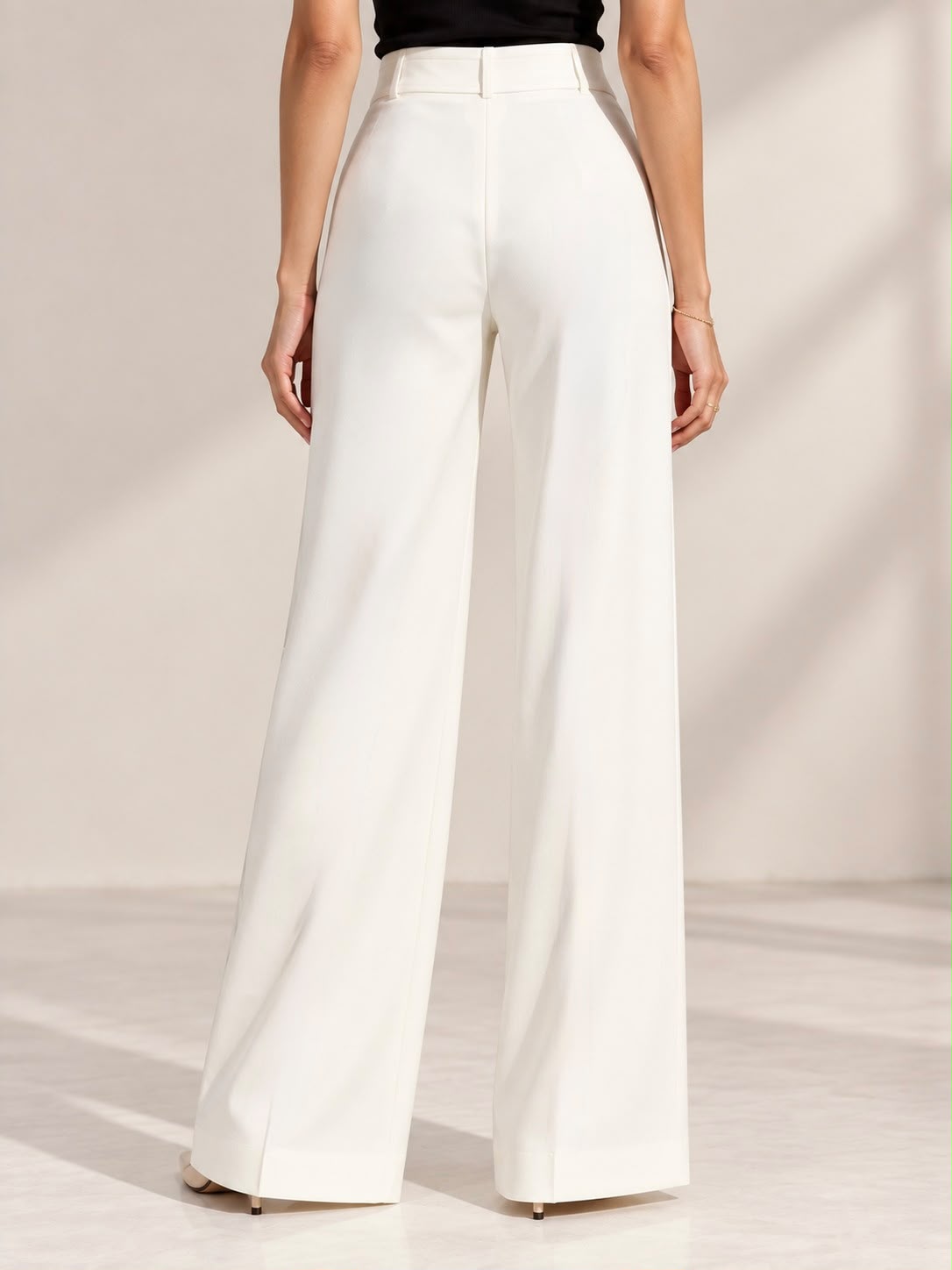 Off-white ultra high-waist wide-leg trousers, back view | Beyond Formals