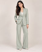 Mint green single-breasted peak lapel blazer with matching wide-leg trousers – full-length front view | Beyond Formals