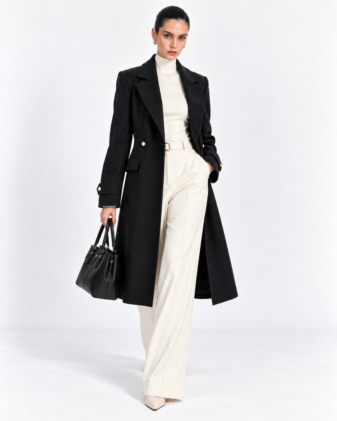 Black Fitted Pearl-Button Long Overcoat for Women – front view, worn open | Beyond Formals