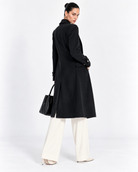 Black Fitted Pearl-Button Long Overcoat for Women – back view with vent | Beyond Formals