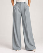 Grey pinstripe trousers close-up of button waistband, front pleats and pockets | Beyond Formals