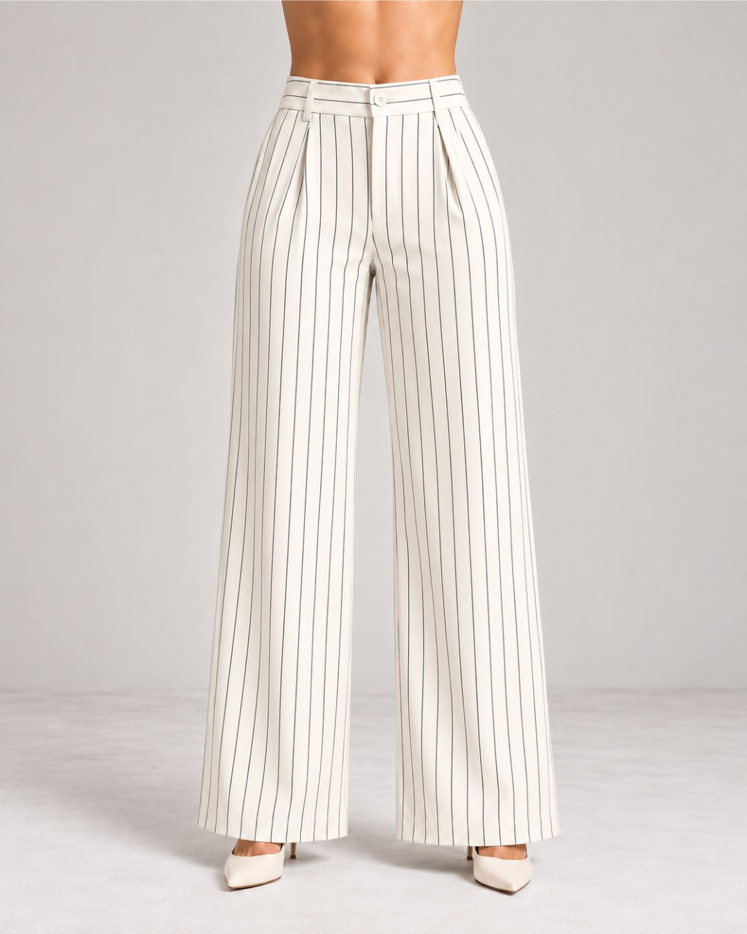 White pinstripe trousers close-up of button waistband, front pleats and wide leg | Beyond Formals